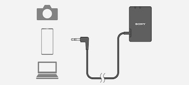 Imagen de un receptor conectado mediante un cable de audio y un miniconector de 3.5 mm a varios dispositivos, como smartphones y PC